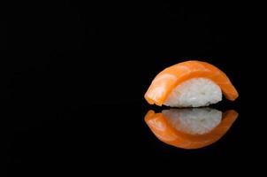 sushi on black background photo