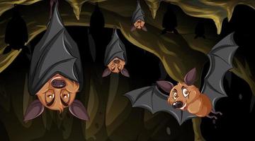 Cave scene with group of bats in cartoon style vector