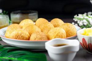 Indian traditional snack. Pani puri with boiled potato and sauce. photo