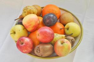 A dish of traditional organic vegetarian fruits photo