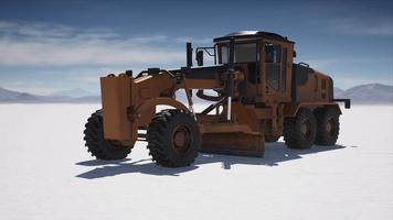 road grading machine on the salt desert road video