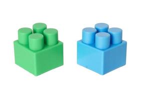 details of a children's plastic constructor on a white background. colored cubes. block. photo