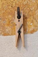 Clothespin or clothes peg spring loaded wood clamp photo