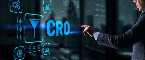 Conversion Rate Optimization. CRO Technology Finance concept Businessman pressing on a virtual screen photo