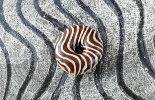 Chocolate donut flat lay photo