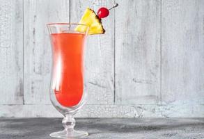 Glass of Singapore Sling photo