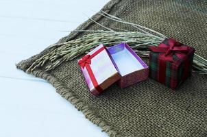Still life of gift box with rice raw food photo