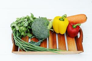 Mixed vegetable a set on wooden basket photo