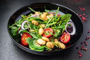 salad white beans, tomato, leaves lettuce mix petals fresh portion healthy meal food photo