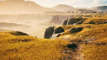 Landscape with mountains and dry yellow grass in New Zealand video