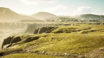 Grasslands wide panorama with autumn grass field and mountains video