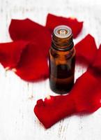 rose flower petals with aromatherapy essential oil photo