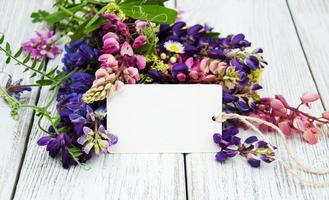 Lupine flowers on a  table photo