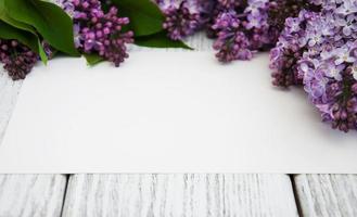 Lilac flowers with empty card photo