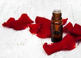 rose flower petals with aromatherapy essential oil photo