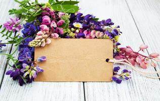 Lupine flowers on a  table photo