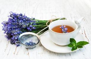 Cup of tea and lavender flowers photo