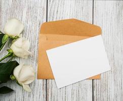 White roses and envelope photo