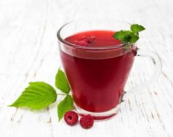 Glass of raspberry lemonade photo