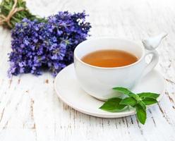 Cup of tea and lavender flowers photo