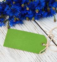 paper tag with  cornflowers photo