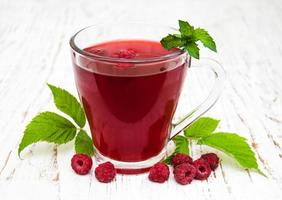 Glass of raspberry lemonade photo