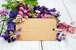 Lupine flowers on a  table photo