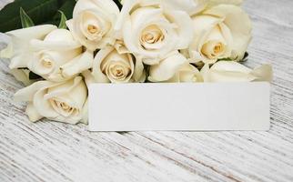 White roses with tag photo