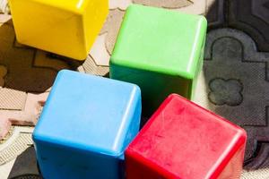 a lot of colorful foam cubes photo