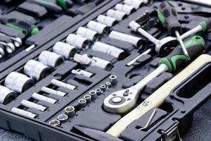 Set of tools for car repair in box, closeup photo