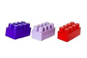 details of a children's plastic constructor on a white background. colored cubes. block. photo