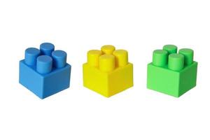 details of a children's plastic constructor on a white background. colored cubes. block. photo