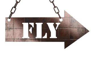 fly word on metal pointer photo