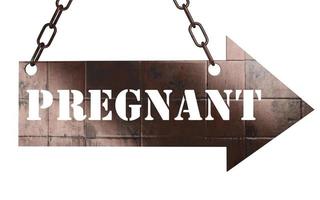 pregnant word on metal pointer photo