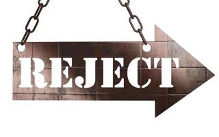 reject word on metal pointer photo