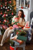 mom and little son in Christmas decor photo