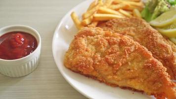 Homemade Breaded Weiner Schnitzel with Potato Chips - Fried Chicken with french fries - European food style