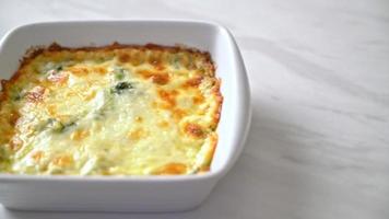 baked spinach lasagna with cheese in white plate video