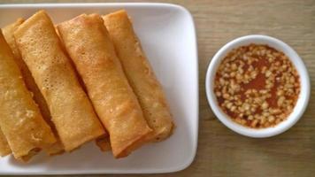 deep fried spring roll with sauce