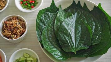 Miang kham - A royal leaf wrap appetizer - It is a traditional Southeast Asian snack from Thailand and Laos video