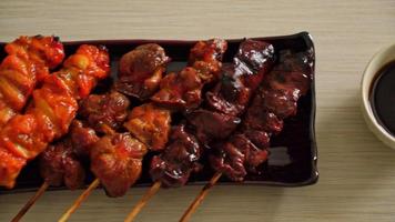 Japanese chicken grill or yakitori serve in izakaya style - Japanese food style video