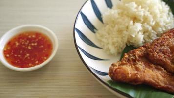 fried chicken with sticky rice and spicy sweet sauce video