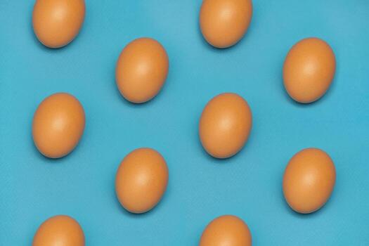 Easter eggs pattern on a blue background photo
