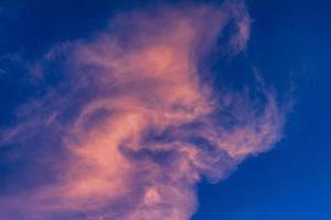 beautiful bright sky with clouds at sunset photo
