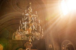 rays of the sun light in the temple window photo