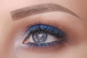 beautiful blue eye close - up, bright make-up photo