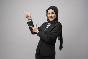 Beautiful business woman with hijab portrait on white background photo