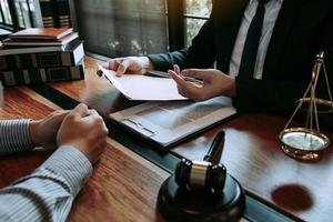 Clients come to seek advice for the law regarding privacy violations with the lawyer at the office. photo