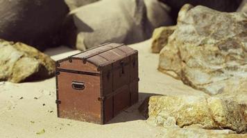 treasure chest in sand dunes on a beach video