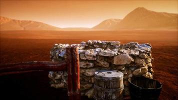 old stone water well in the desert video